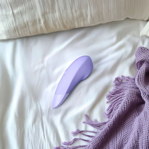 Стимулятор клітора Enhance Lilac Womanizer